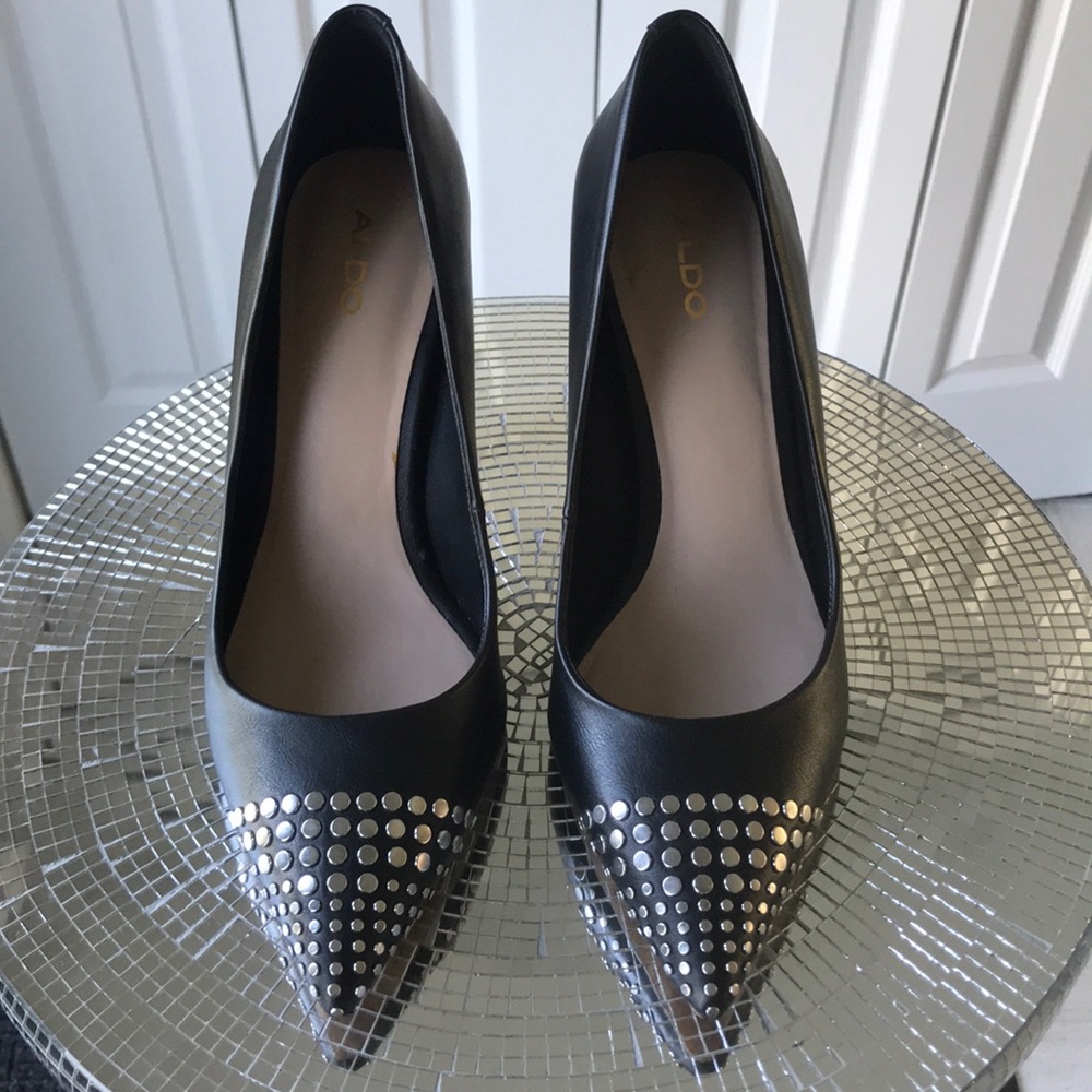 Aldo pumps with decorative silver studs.
